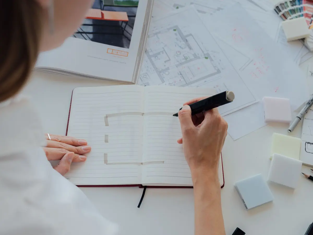Interior designer developing a room layout and design direction
